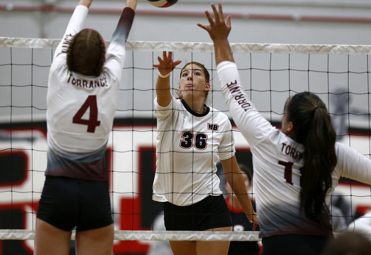 Huntington Beach's Kylie Leopard (36) competes against Torrance during the Lakewood Molten Classic at Artesia High.