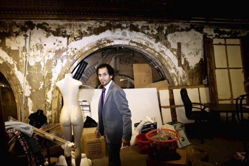 Developer Nick Hadim stands inside a storage area next to the Alexandria Hotel at 5th and Spring streets downtown. He plans to spend $3 million to transform the Alexandria's abandoned wing.