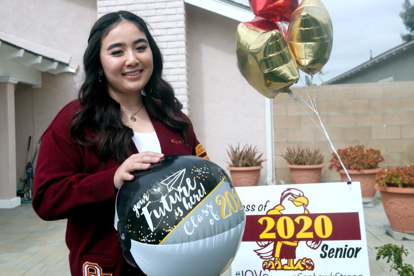 Alyson Nguyen of Ocean View High at her home in Cypress on Friday, May 29, 2020.. Nguyen was ASB president her senior year and also played in the volleyball team.