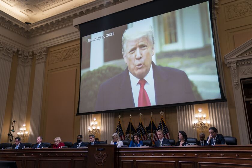 WASHINGTON, DC - JULY 21: A video of former President Donald Trump is seen on a screen during a hearing of the House Select Committee to Investigate the January 6th Attack on the United States Capitol in the Cannon House Office Building on Thursday, July 21, 2022 in Washington, DC. The bipartisan Select Committee to Investigate the January 6th Attack On the United States Capitol has spent nearly a year conducting more than 1,000 interviews, reviewed more than 140,000 documents day of the attack. (Kent Nishimura / Los Angeles Times)