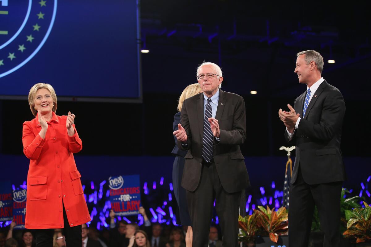 DES MOINES, IA - OCTOBER 24: Democratic presidential candidates Hillary Clinton, Senator Bernie Sanders (I-VT), and Martin O'Malley are introduced at the Jefferson-Jackson dinner on October 24, 2015 in Des Moines, Iowa. The dinner is a major fundraiser for Iowa's Democratic Party. (Photo by Scott Olson/Getty Images) ** OUTS - ELSENT, FPG, CM - OUTS * NM, PH, VA if sourced by CT, LA or MoD **