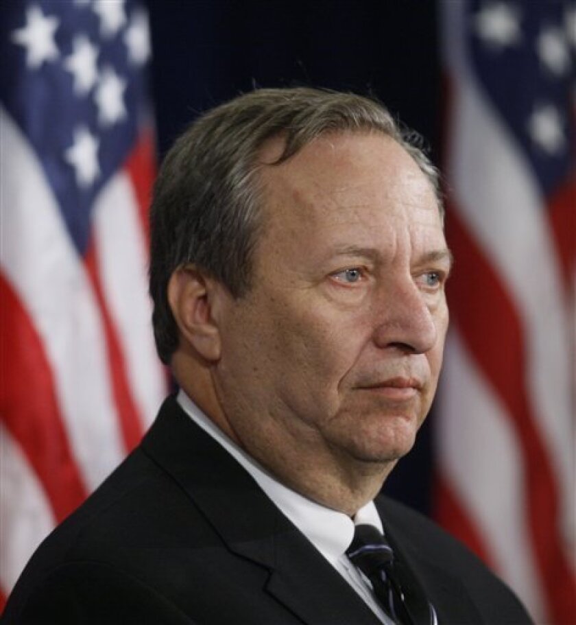 National Economic Council Chair-designate Lawrence Summers, listens as President-elect Barack Obama, not pictured, spekas during a news conference in Chicago, Monday, Nov. 24, 2008. (AP Photo/Charles Dharapak)