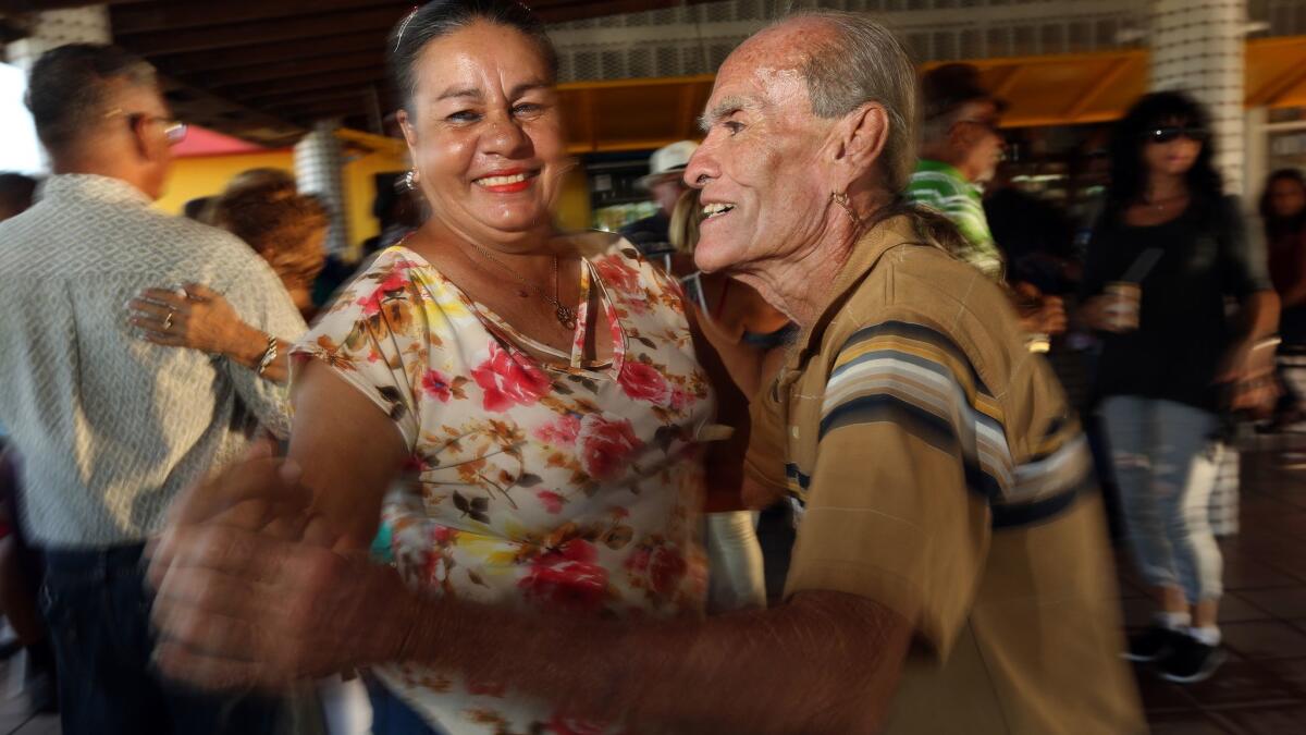 In Yabucoa, dancers enjoy the music that was silenced after Hurricane Maria.