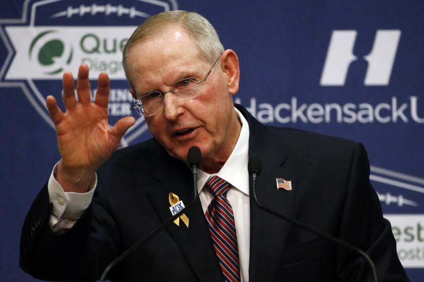 Former New York Giants coach Tom Coughlin speaks during a news conference on Jan. 5.