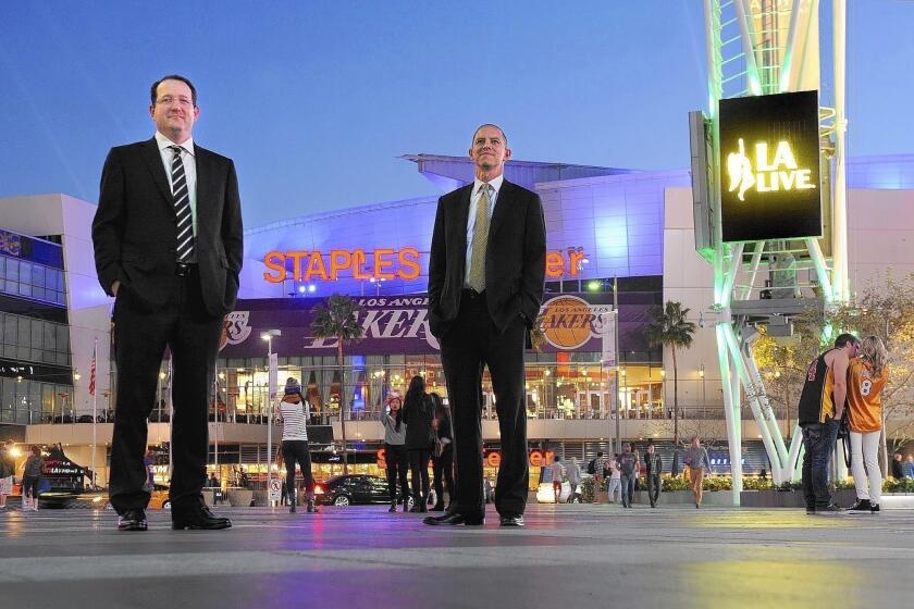 AEG executives Dan Beckerman, left, and Ted Fikre in front of Staples Center and L.A. Live in downtown Los Angeles.