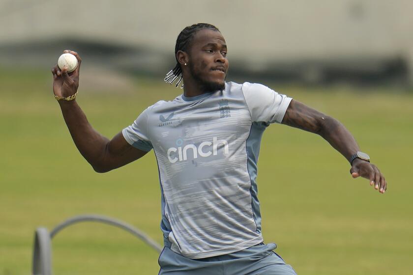 FILE - England's Jofra Archer participates in a training session ahead of their second T20 cricket match against Bangladesh in Dhaka, Bangladesh, on March 11, 2023. The return of fast bowler Jofra Archer has boosted England's chances of becoming the first team to win consecutive Twenty20 World Cups. (AP Photo/Aijaz Rahi, File)