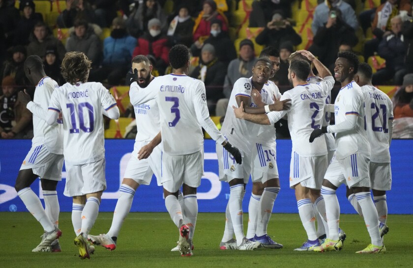 Real Madrid's players celebrate after scoring their side's second goal during the Champions League, group D soccer match between Sheriff Tiraspol and Real Madrid in Tiraspol, the capital of the breakaway region of Transnistria, a disputed territory unrecognized by the international community, in Moldova, Wednesday, Nov. 24, 2021. (AP Photo/Sergei Grits)