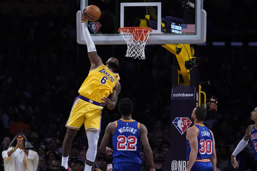 Los Angeles Lakers forward LeBron James (6) shoots during the second half.
