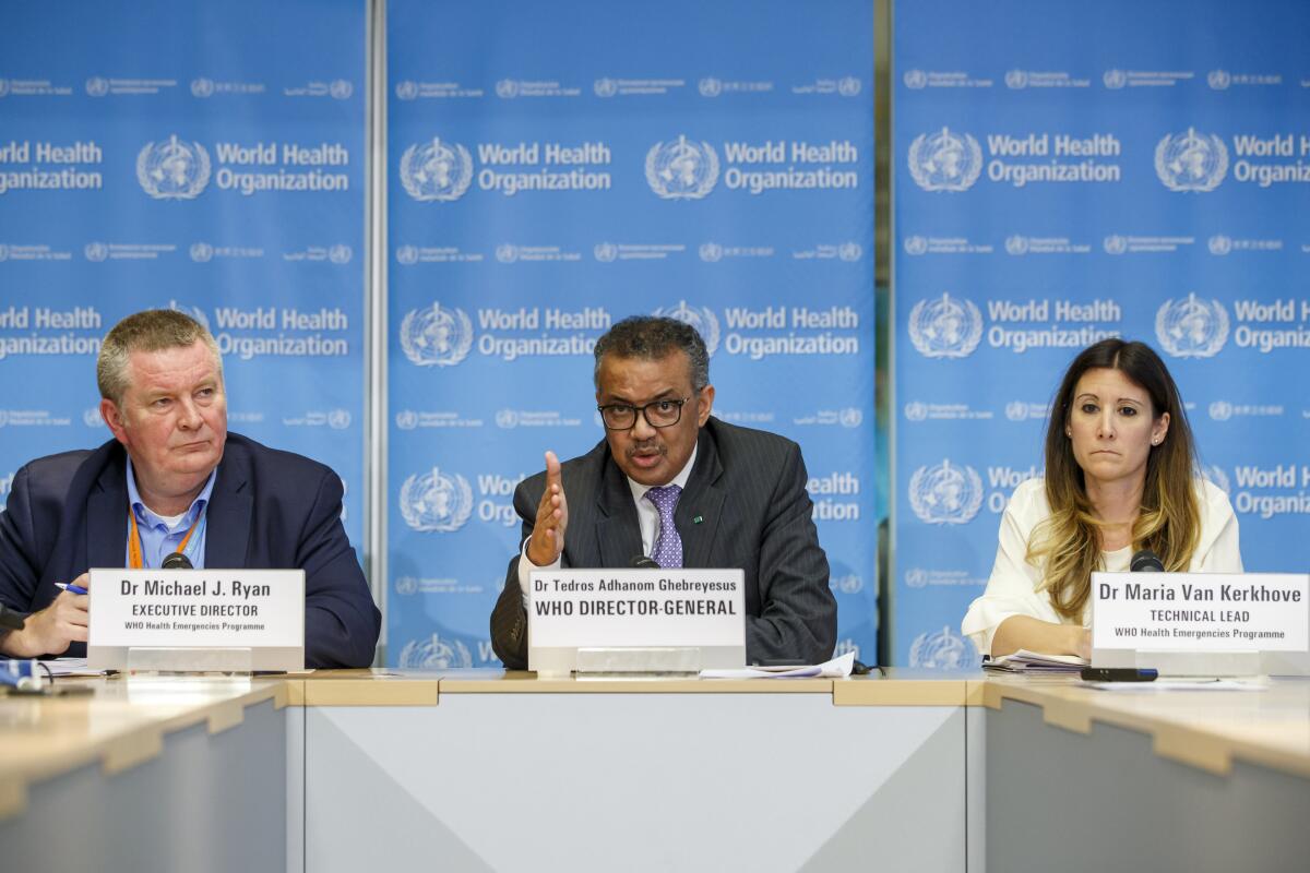 Tedros Adhanom Ghebreyesus, center, director general of the World Health Organization, discusses the novel coronavirus.