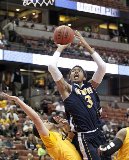 UC Irvine's Will Davis II, right, goes up against Long Beach State.