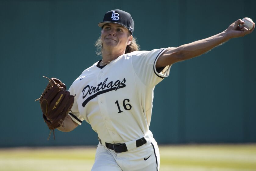 Long Beach pitcher Adam Seminaris (16) warms up prior to a Nevada Wolf Pack.