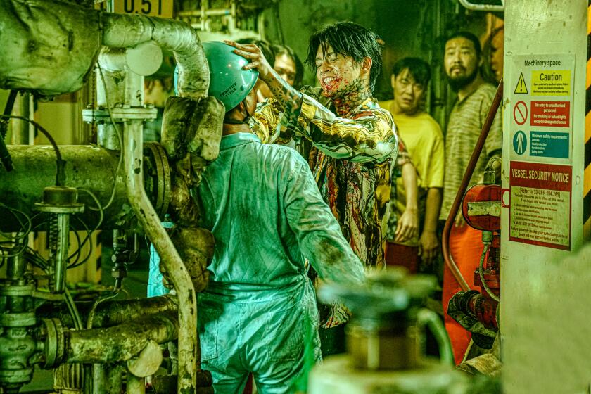 Passengers look on as tattooed hate boy Jong-du (Seo In-guk) gets to the point in Korean death fest "Project Wolf Hunting."