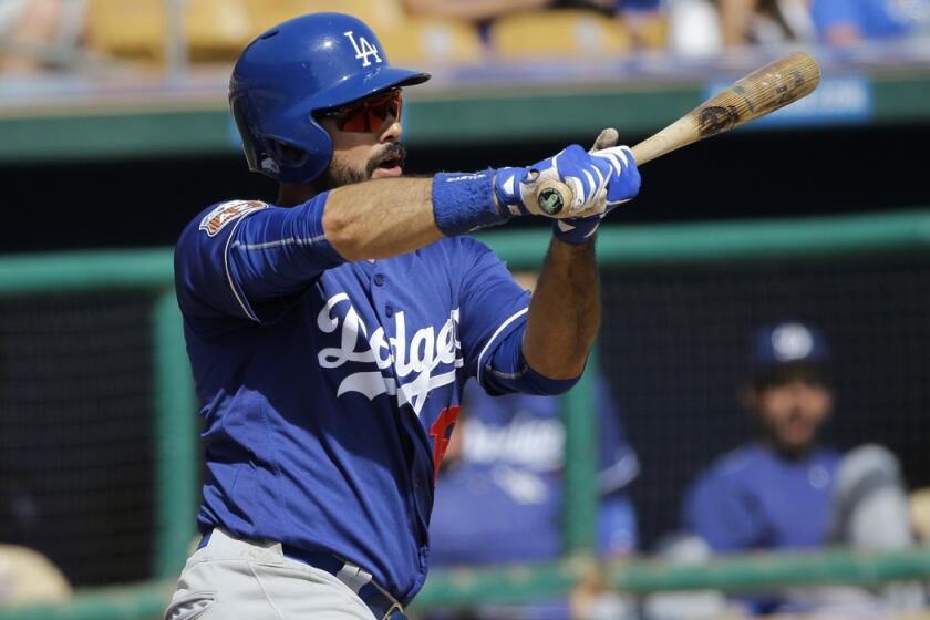 Dodgers outfielder Andre Ethier swings during a spring-training game against the Chicago White Sox on March 15 in Phoenix.