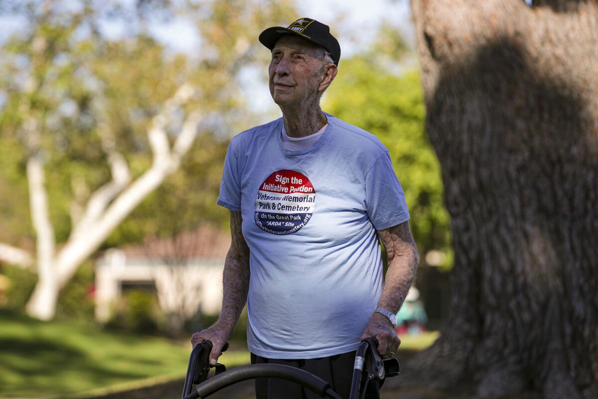 An 88-year-old Army veteran stands outside.