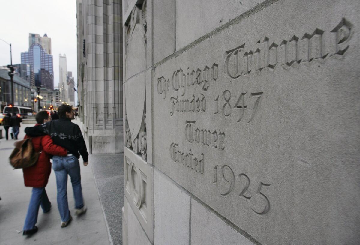Tribune Co., owner of the Los Angeles Times, KTLA-TV and other media properties, reported declines in first-quarter income and revenue. Above, the front entrance of Tribune Tower in Chicago.