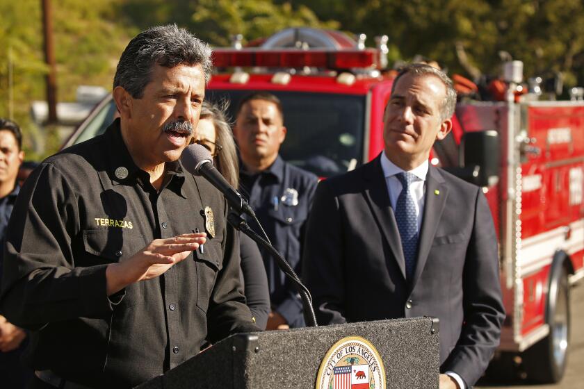 LOS ANGELES, CA - FEBRUARY 11, 2020 LA City Fire Department (LAFD) Chief Ralph Terrazas, left, with Mayor Eric Garcetti announce the expansion of the LAFD’s Fast Response Vehicle (FRV) program. The LAFD now has four FRV’s in service citywide, which provide a flexible, multi- mission resource to respond to fire and emergency medical service calls. (Al Seib / Los Angeles Times)