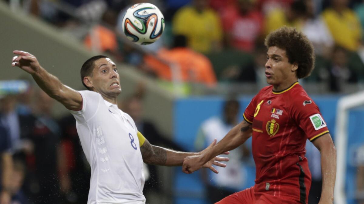 U.S. forward Clint Dempsey, left, challenges Belgium's Axel Witsel for the ball during the USA's 2-1 loss in the World Cup on Tuesday.