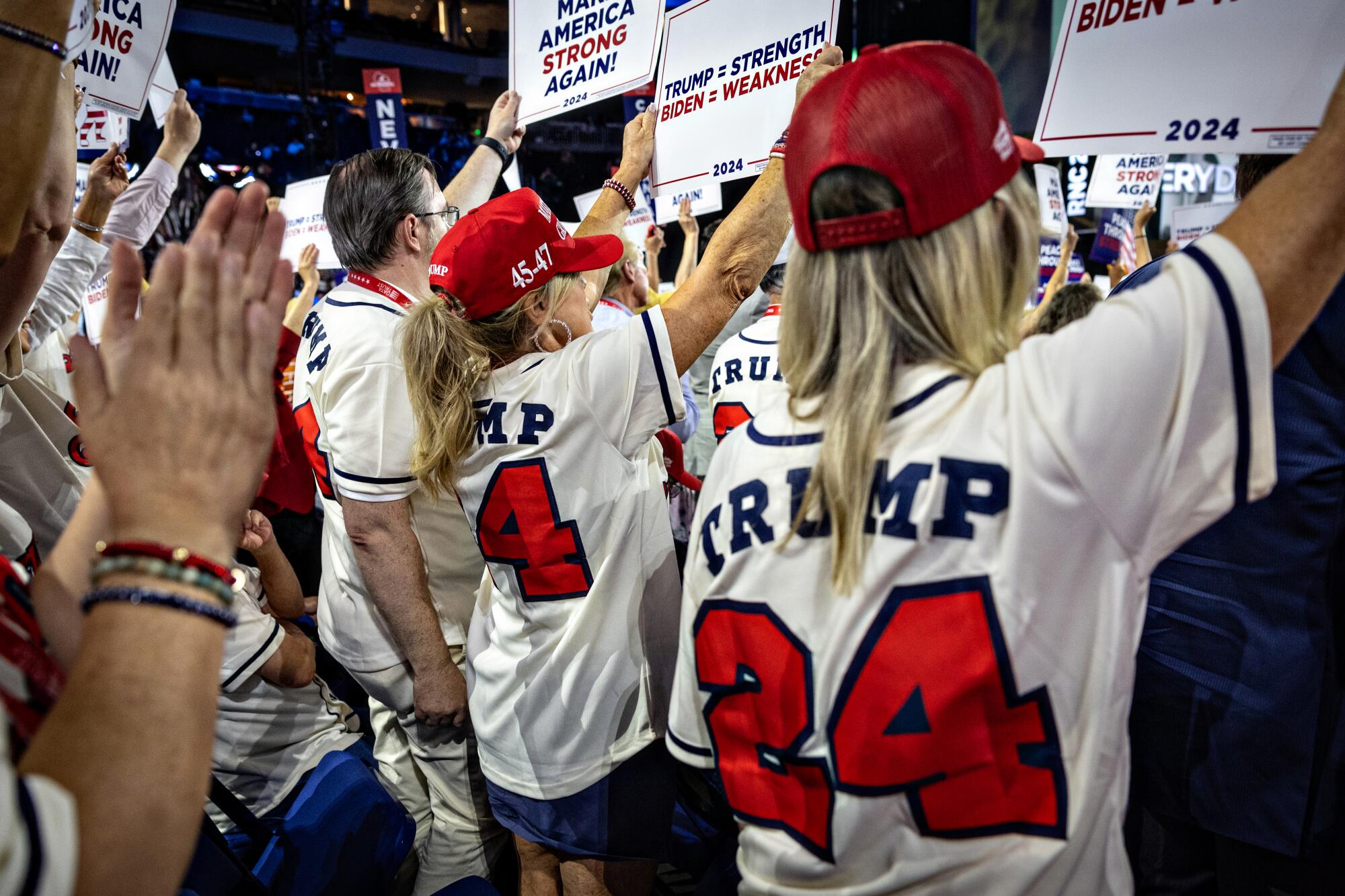 Texas delegates wear custom baseball jerseys with Trump 24 on the back at the
