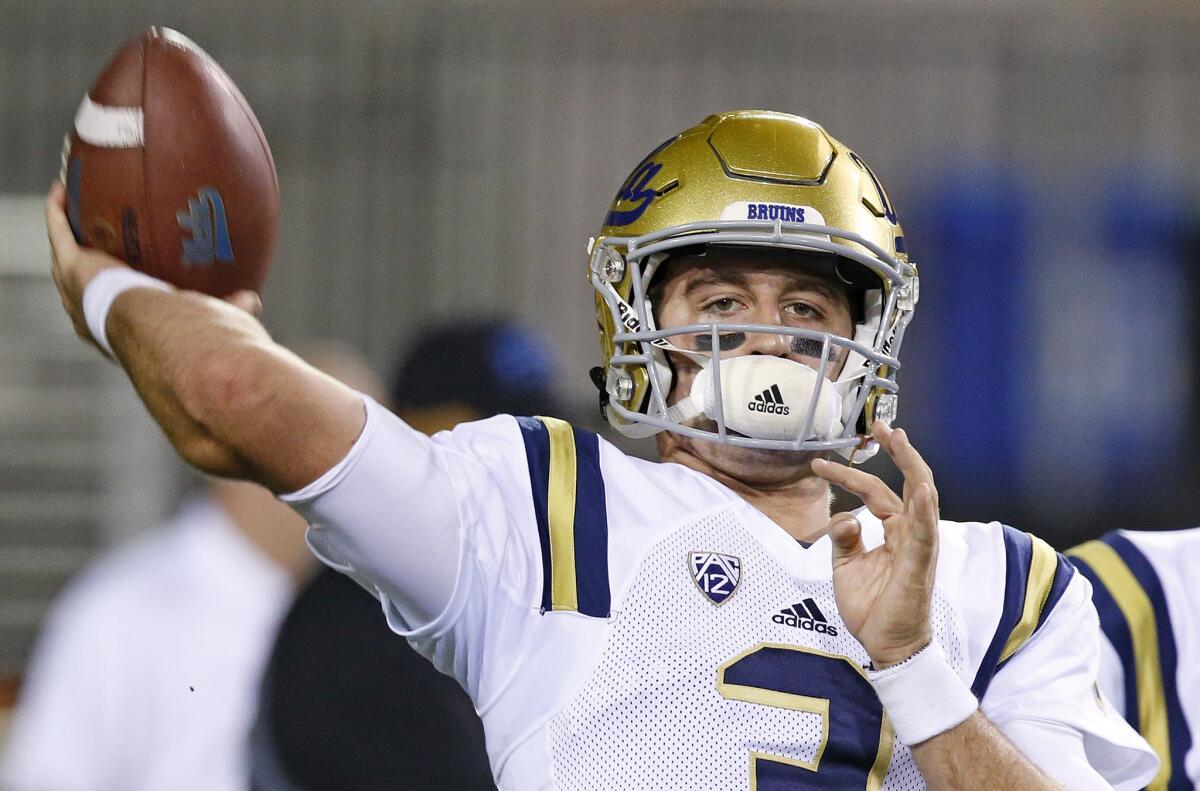 UCLA quarterback Josh Rosen warms up before a game against Arizona State on Oct. 8.