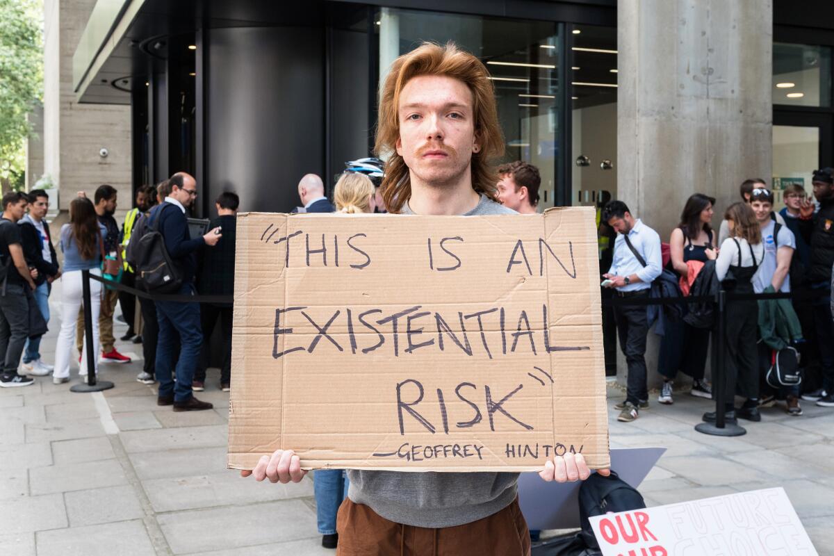 Demonstrators protest against OpenAI's aim to develop artificial general intelligence.