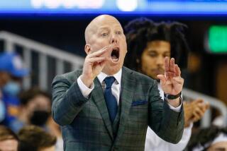 UCLA head coach Mick Cronin calls out his players during the second half of an NCAA college basketball game.