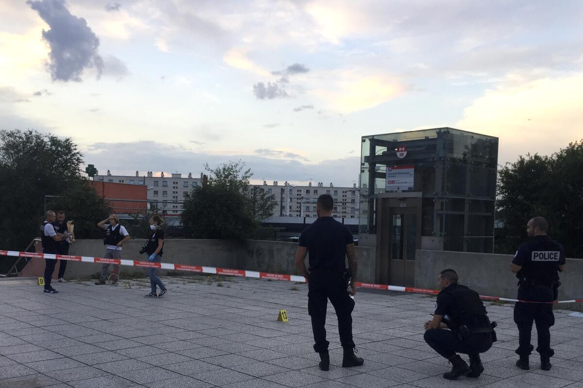 French police investigate after an assailant fatally stabbed one person and injured nine others.