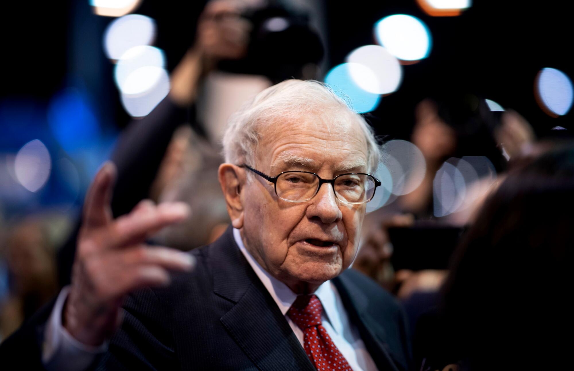 Warren Buffett arrives at a Berkshire Hathaway shareholders meeting in Omaha in 2019.