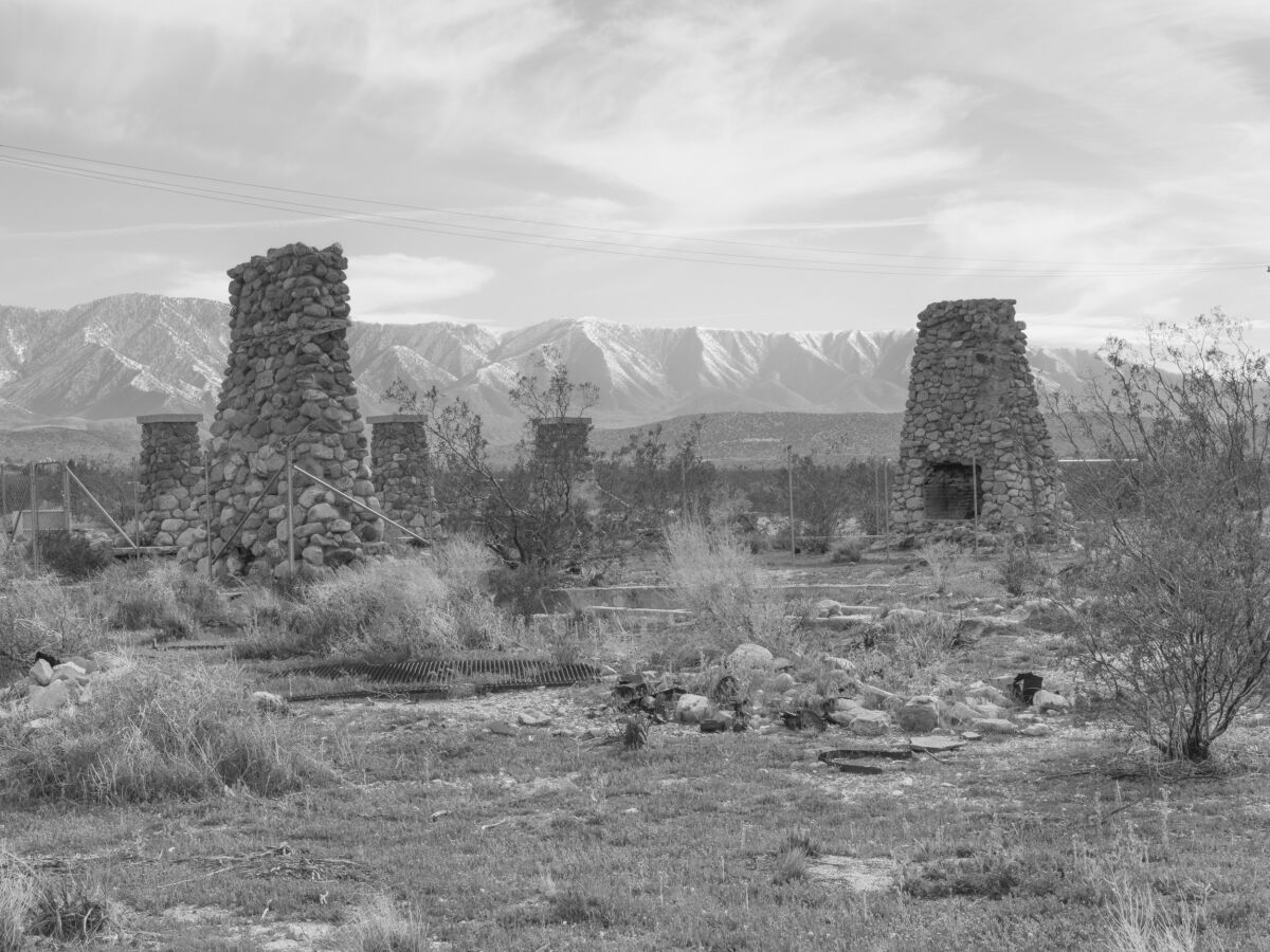 Ruins of the Llano del Rio colony in the Antelope Valley, with mountains in the background