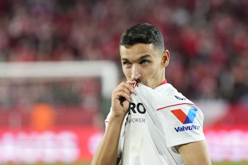 FILE - Sevilla's Jesus Navas celebrates at the end of the Europa League semifinal second leg soccer match between Sevilla and Juventus, at the Ramon Sanchez Pizjuan stadium in Seville, Spain, on May 18, 2023. Spain coach Luis de la Fuente recalled veteran Jesús Navas to his squad for the Nations League final four. The 37-year-old Navas is the sole remaining member of Spain’s 2010 World Cup-winning team. (AP Photo/Jose Breton, File)