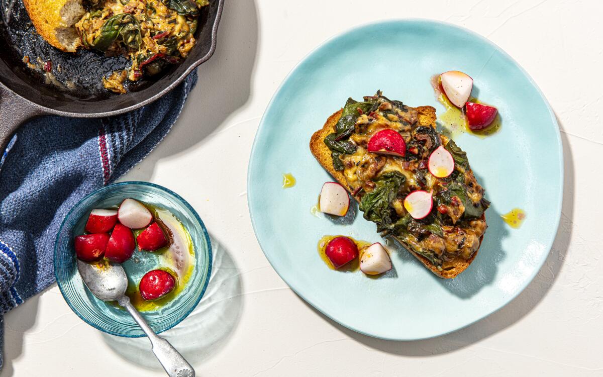 Crisp radishes that serve as a foil to thick toast topped with Swiss chard greens mingled with Swiss cheese.