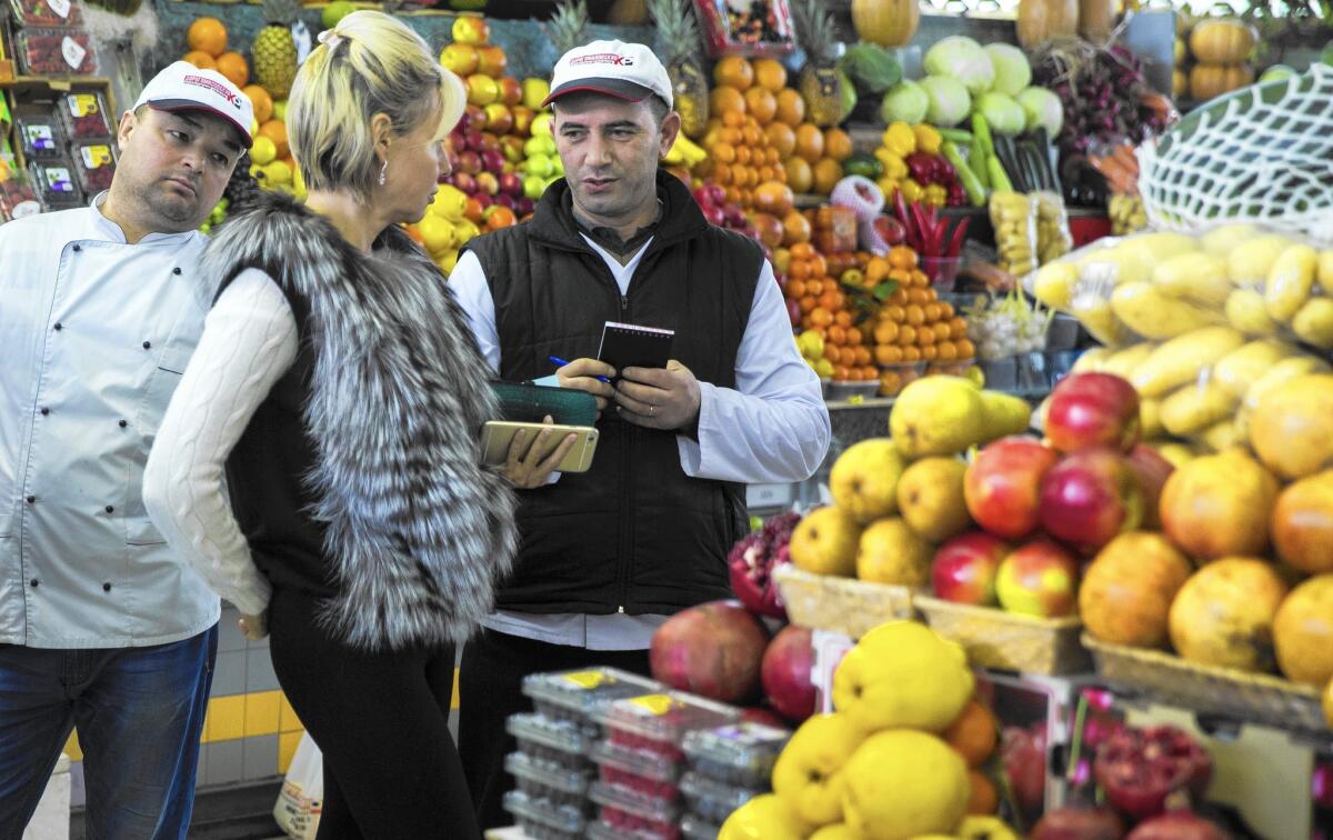 A market in central Moscow. Russia's ban on European Union food imports has inflicted pain on major exporters such as Italy, Greece, Cyprus and Hungary.