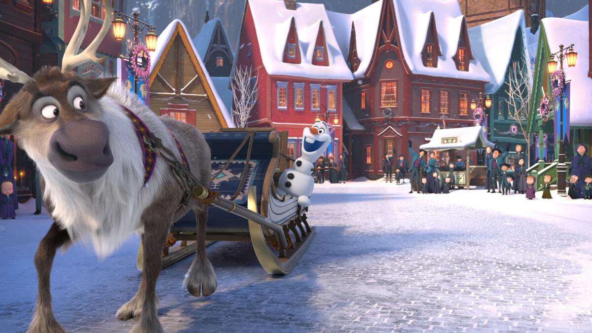 Olaf (voice of Josh Gad) teams up with Sven (the reindeer) for a holiday-themed short titled "Olaf's Frozen Adventure." (Walt Disney Animation Studios)