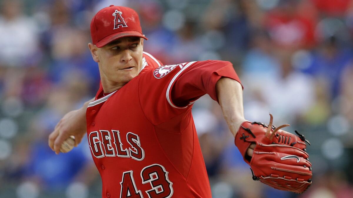 Angels starter Garrett Richards delivers a pitch against the Texas Rangers in July.