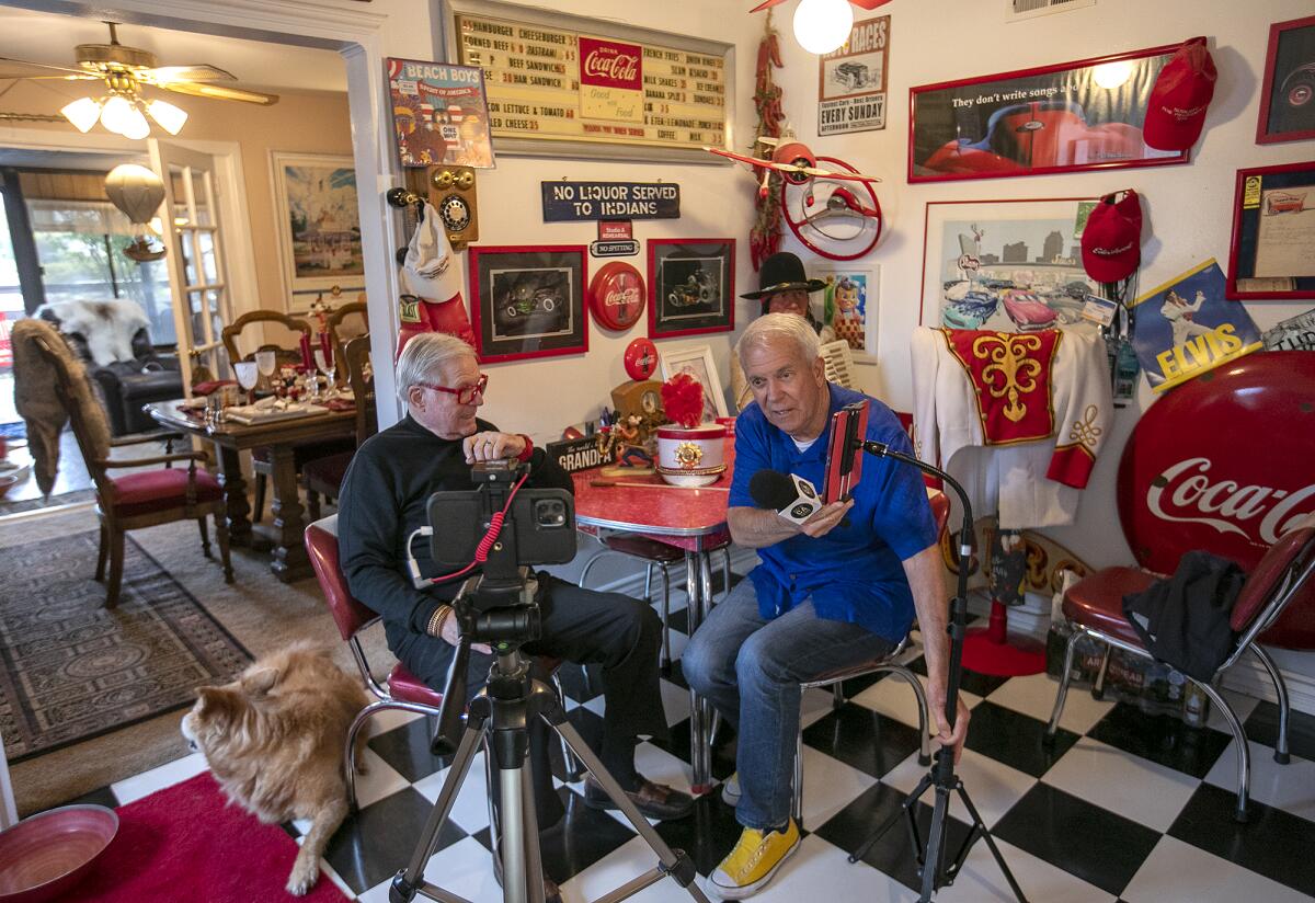 Pat Pattison, right, films a segment Wednesday for "The Best of California" at the Placentia home of Stanford Freese.