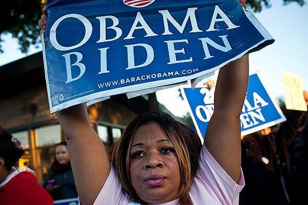 A woman supports U.S. President Barack Obama