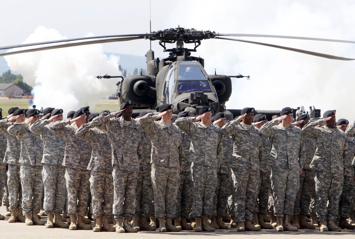 Soldiers attend a ceremony in 2011 of the First Armored Division at the U.S. Army Airfield in Wiesbaden, Germany.