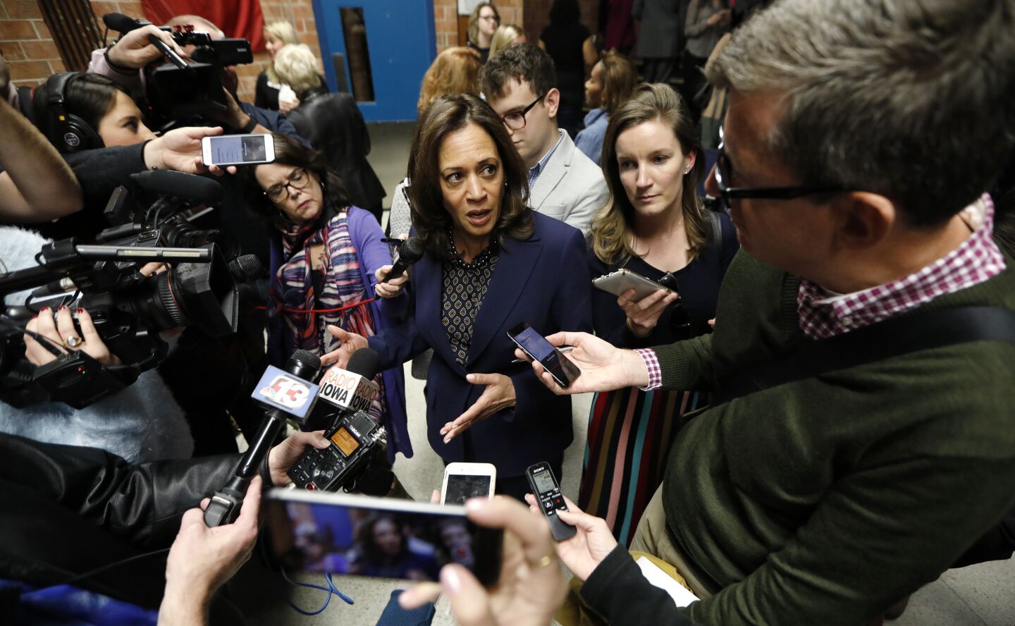 Oct. 22, 2018: Sen. Kamala Harris speaks to reporters following a get out the vote rally in Ankeny, Iowa.