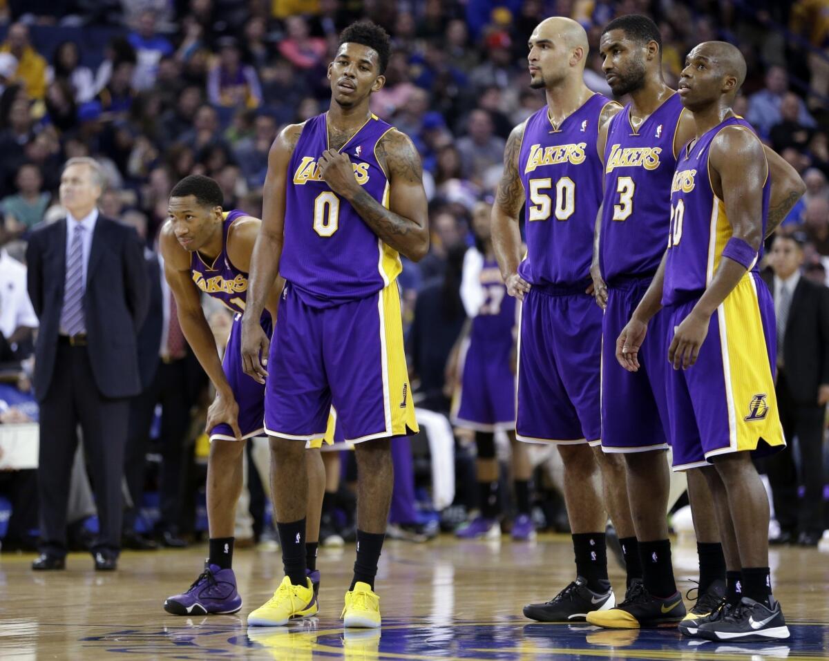 Lakers players (from left to right) Wesley Johnson, Nick Young, Robert Sacre, Shawne Williams, and Jodie Meeks have seen increased playing time due to a rash of injuries plaguing the team.