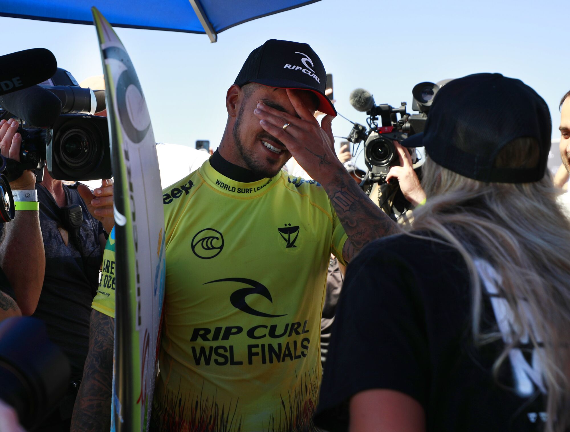 Gabriel Medina of Brazil gets emotional after he won the world championship at the World Surf League Finals 