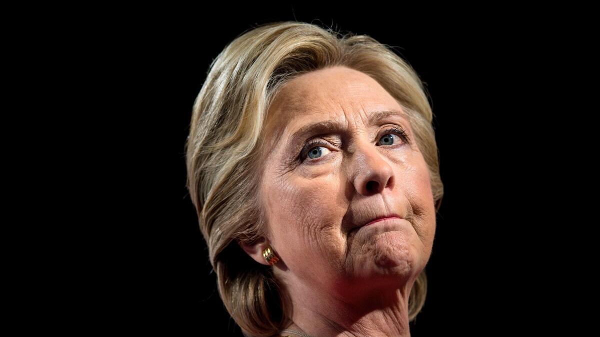 Democratic presidential nominee Hillary Clinton pausing while speaking during a rally at the Grand Valley State University Fieldhouse in Allendale, Mich., on Nov. 7, 2016.