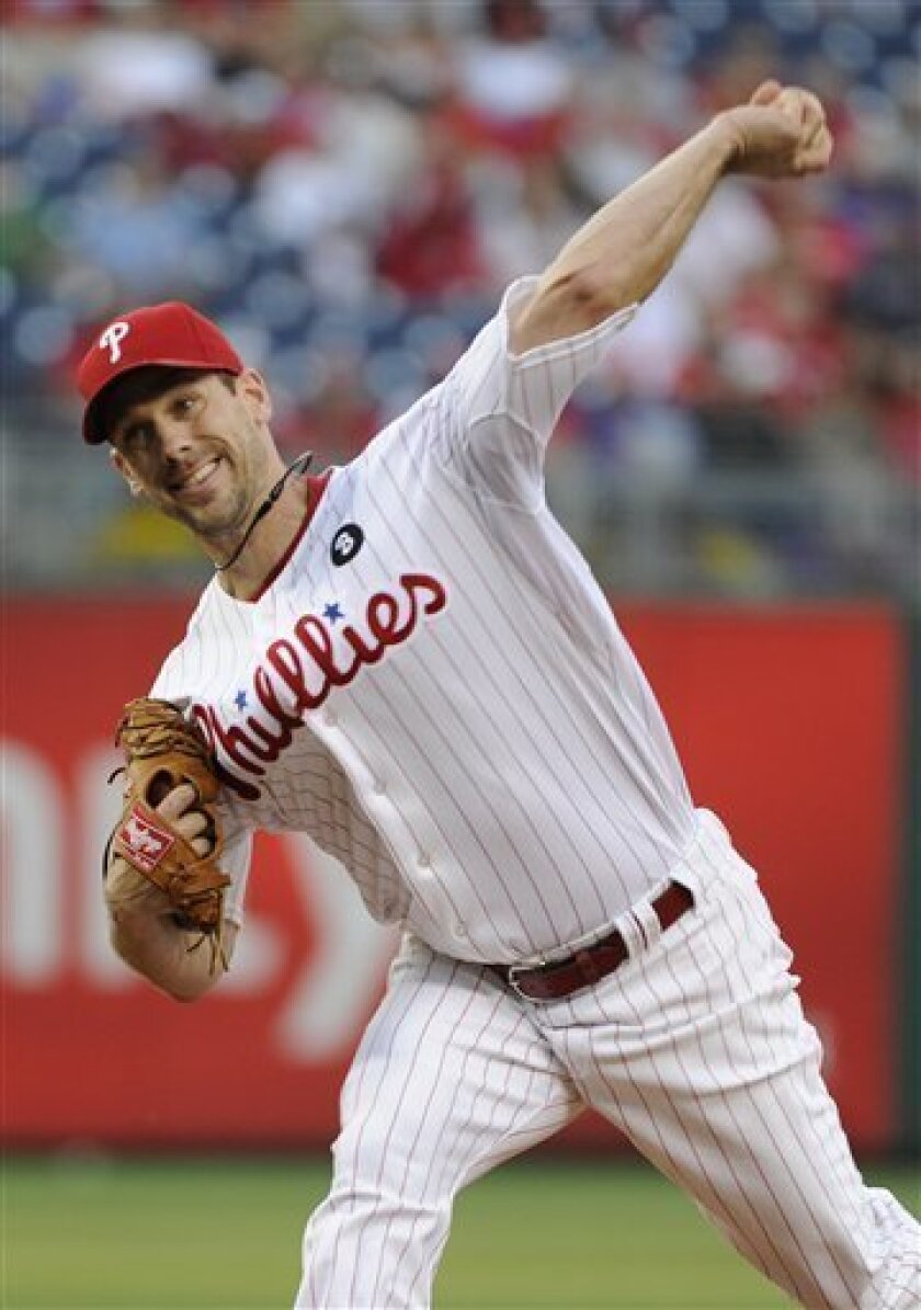 Philadelphia Phillies starting pitcher Cliff Lee delivers to the plate during the first inning of a baseball game against the Atlanta Braves, Friday, May 6, 2011, in Philadelphia. (AP Photo/Barbara Johnston)