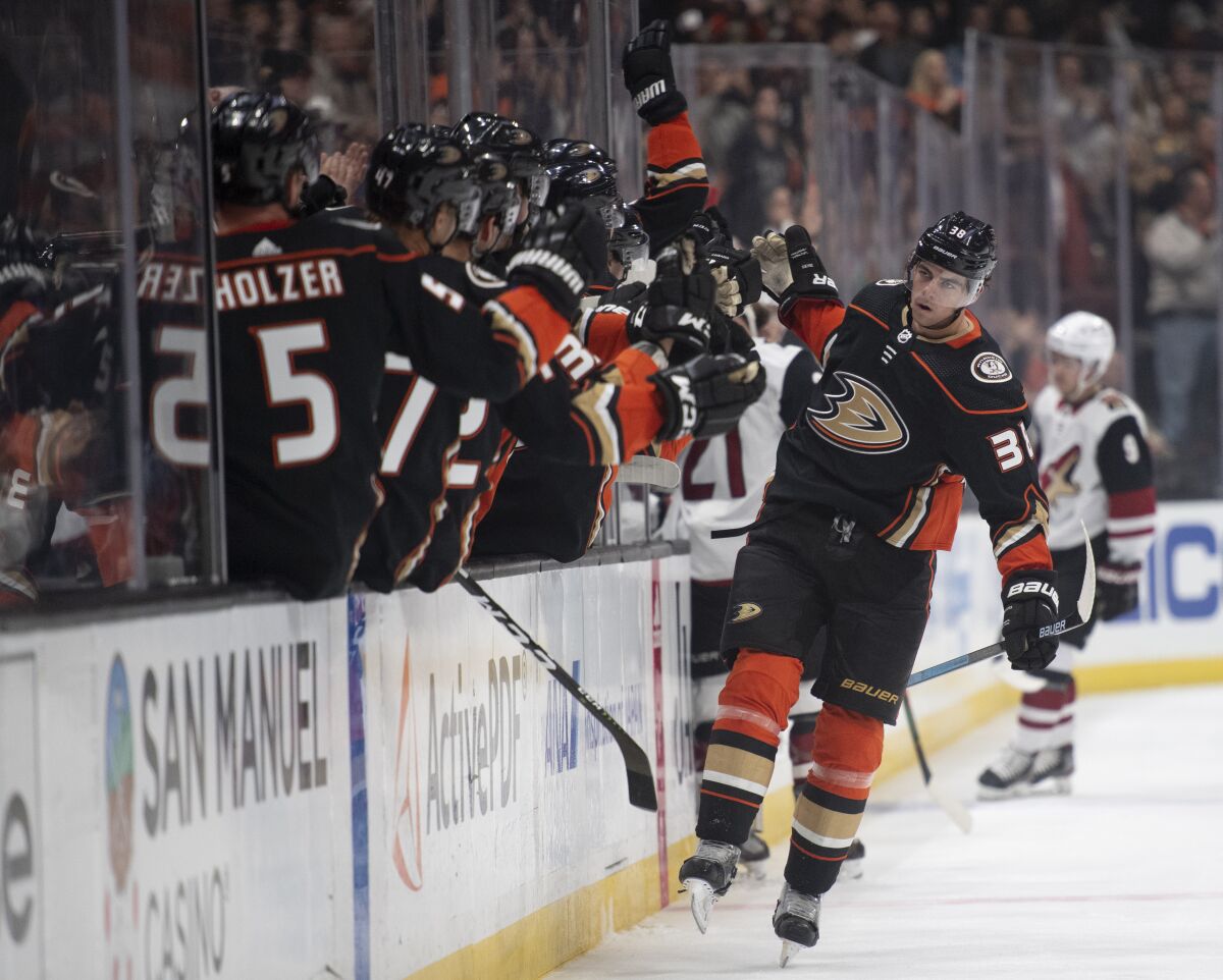 Ducks center Derek Grant is congratulated for his goal during the first period against the Arizona Coyotes on Thursday at Honda Center.