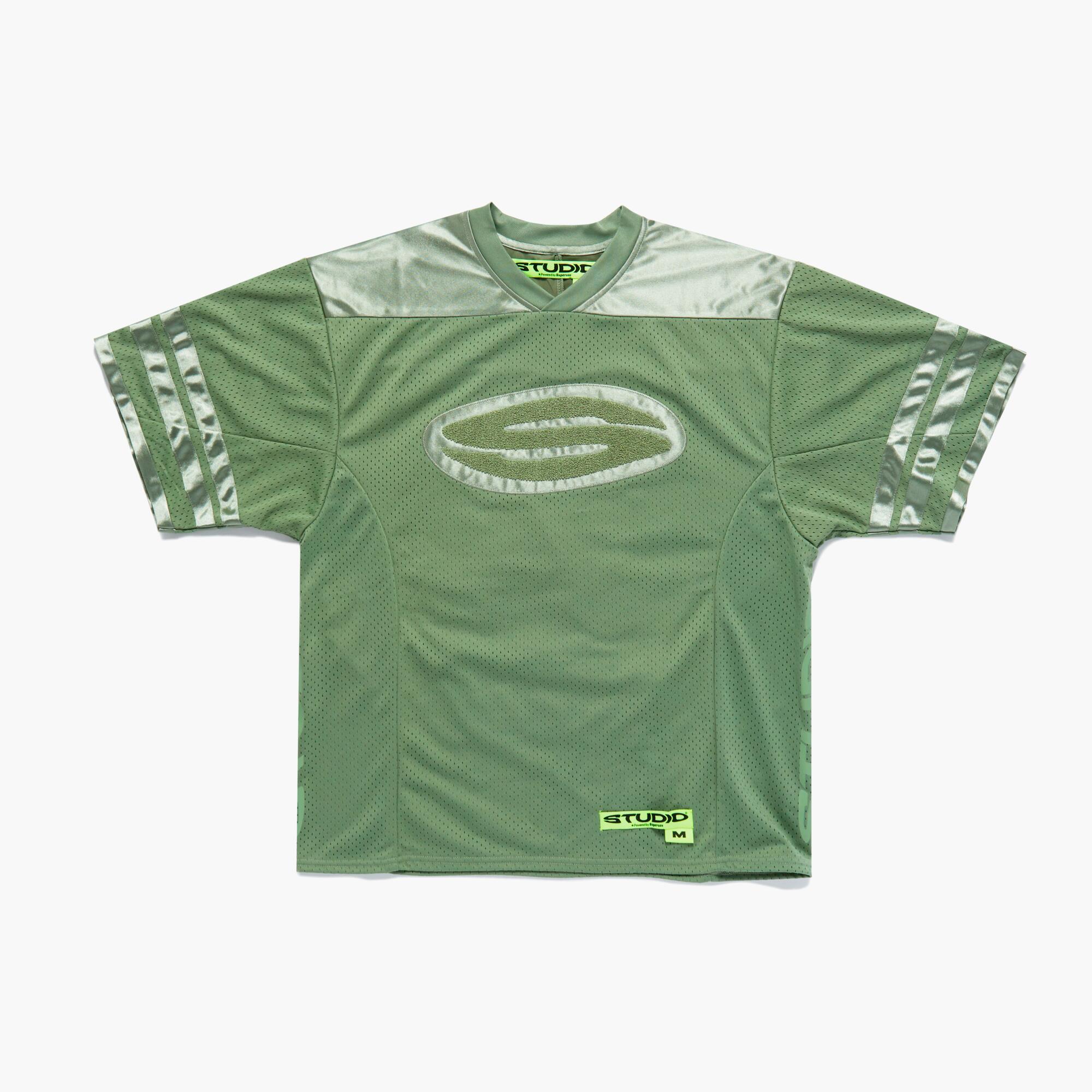 A green shirt with an S on the chest