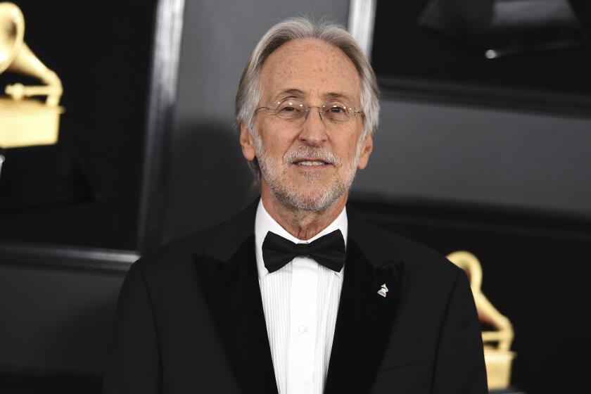 FILE - This Feb. 10, 2019 file photo shows then President and CEO of The Recording Academy Neil Portnow at the 61st annual Grammy Awards in Los Angeles. Portnow says a rape allegation against him aired in a complaint against the Recording Academy by his successor is “false and outrageous.” Portnow released a statement saying the academy during his tenure had conducted a thorough and independent investigation and he was “completely exonerated.” (Photo by Jordan Strauss/Invision/AP, File)