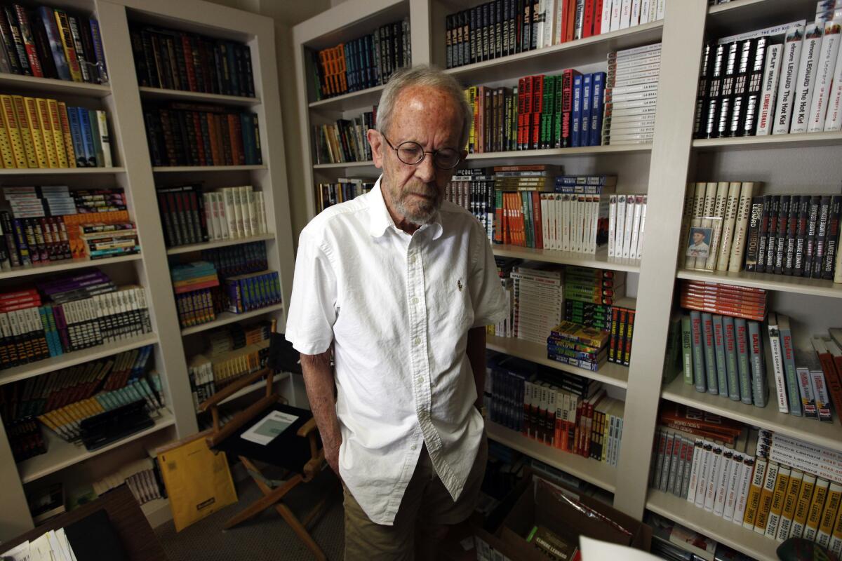 Elmore Leonard, at home in 2012, died in 2013. Books and furniture from his home are being sold at an estate sale.