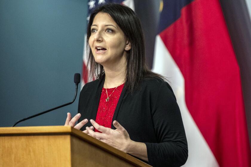 FILE - Secretary of the North Carolina Department Health and Human Services Dr. Mandy Cohen speaks during a briefing on the state's coronavirus pandemic response Tuesday, Dec.22, 2020 at the N.C. Emergency Operations Center in Raleigh, N.C. The White House announced Friday, June 16, 2023, that Cohen will be the new director of the Centers for Disease Control and Prevention. She succeeds Dr. Rochelle Walensky, who last month announced she was resigning effective June 30. (Travis Long/The News & Observer via AP, File)