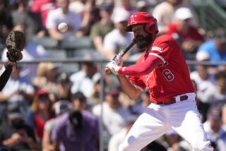 Angels' Anthony Rendon takes an inside pitch during a baseball game against the White Sox