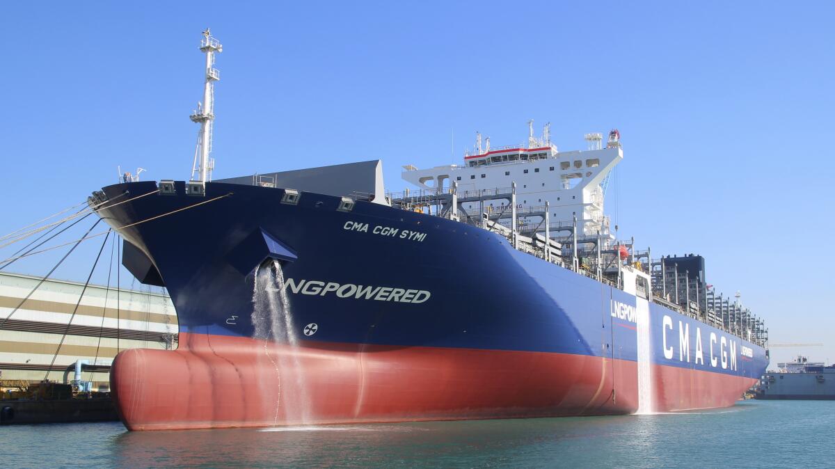 The container ship CMA CGM Symi in a port