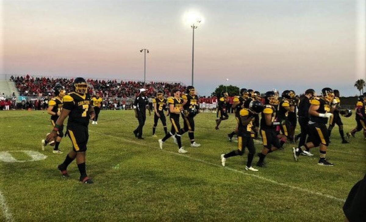 San Pedro players head to the sideline after warming up for their game against Banning.