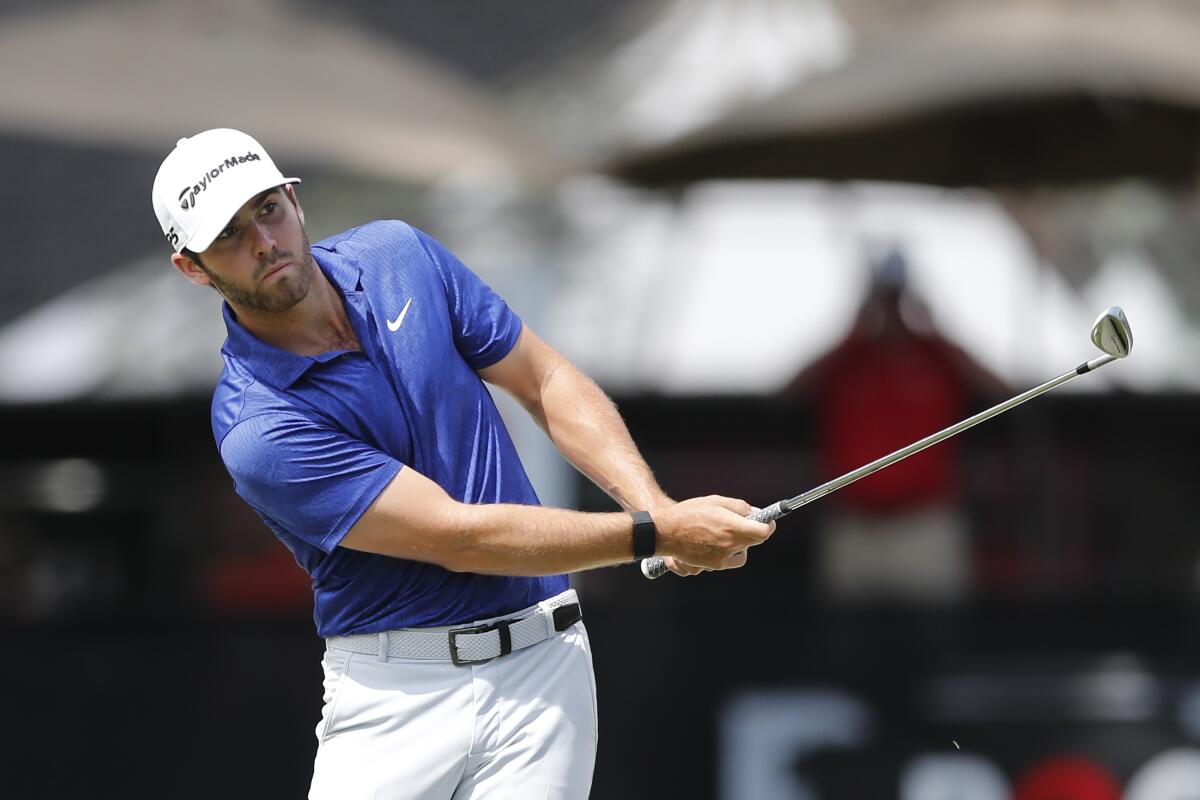 Matthew Wolff hits a shot at No. 11 during the third round of the Rocket Mortgage Classic on July 4, 2020.